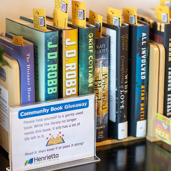 Community Book Giveaway shelf at Union Place Coffee Roasters