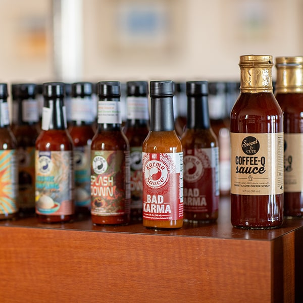 Shelf at Union Place Coffee Roasters full of coffee sauces for grilling