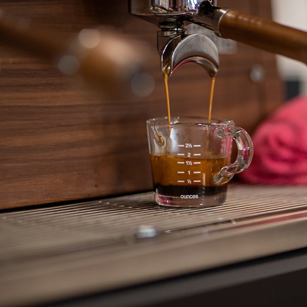 An espresso machine pouring the perfect shot