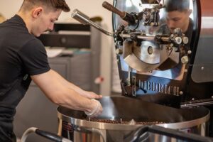 Nick at Union Place Coffee Roasters roasting a small batch of coffee beans