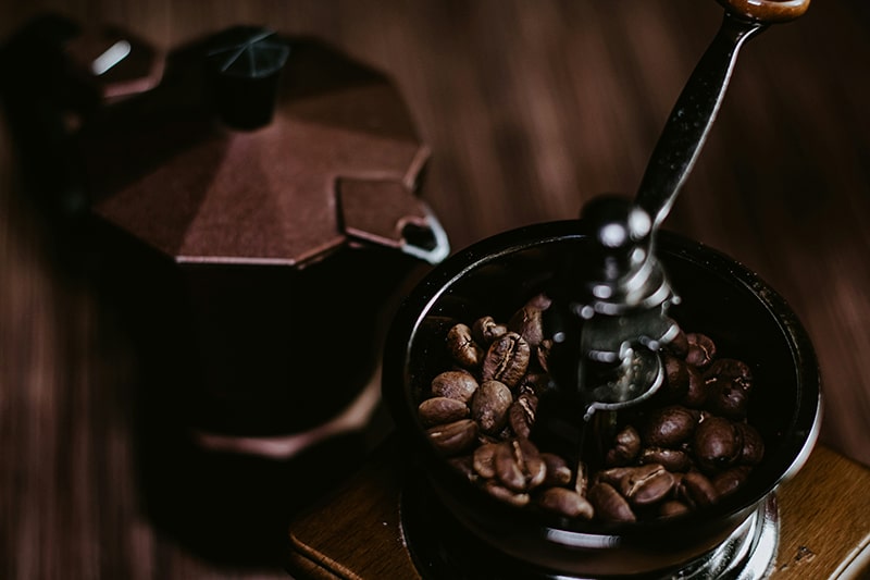 Coffee beans in a grinder at Union Place Coffee Roasters